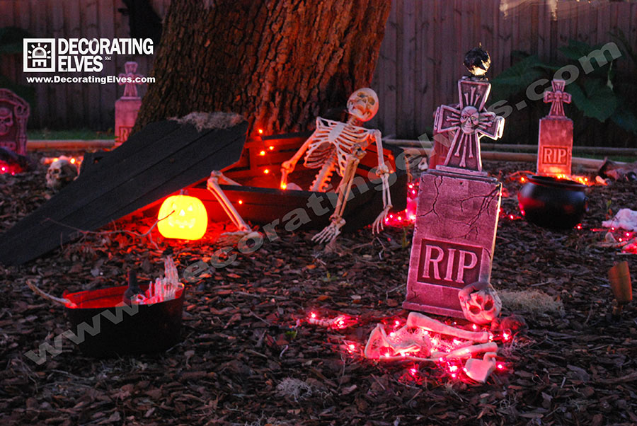 Halloween Lighted Graveyard Scene with Skeleton in a Coffin and Tombstones