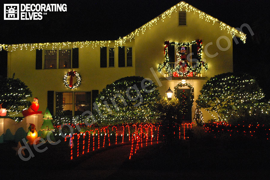 Residential-Holiday-Lighting-Icicle-lights-roof-edge,-Wreaths-Cane-Lighted-Path-www.decoratingelves.com