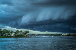 storm cloud over homes on water