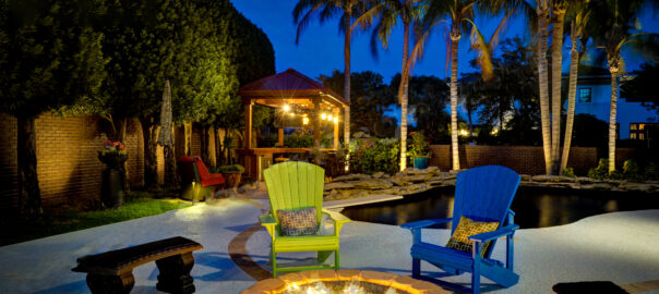Backyard retreat with fire pit and landscape lighting